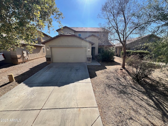 view of front of property featuring a garage