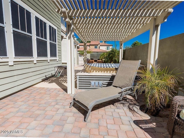 view of patio with fence and a pergola