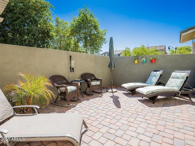 view of patio / terrace featuring fence private yard