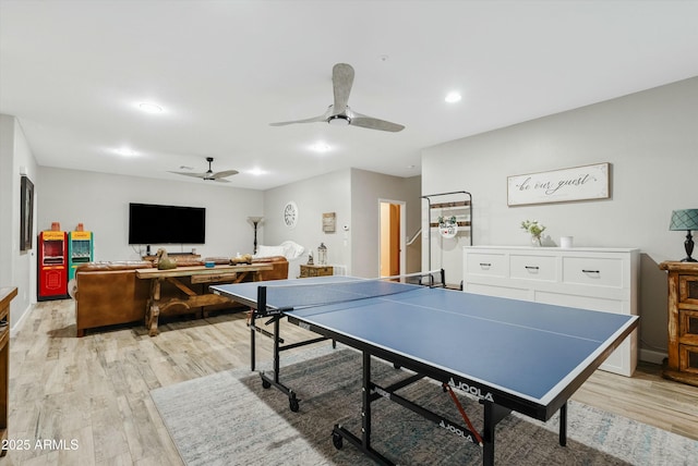 recreation room with light hardwood / wood-style flooring and ceiling fan