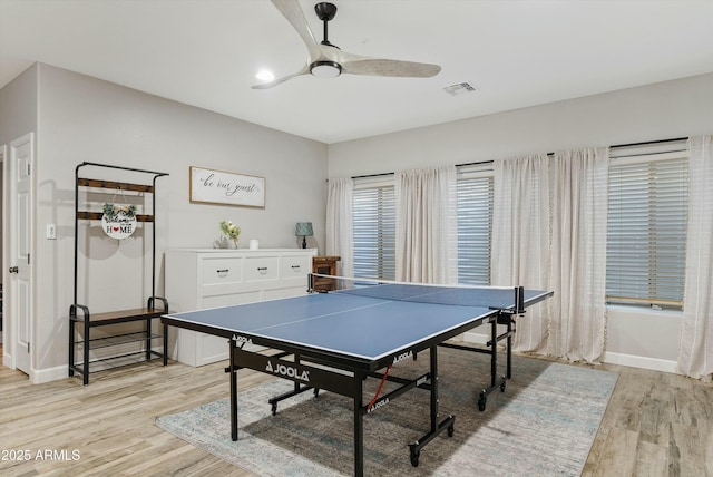 game room featuring ceiling fan and light wood-type flooring