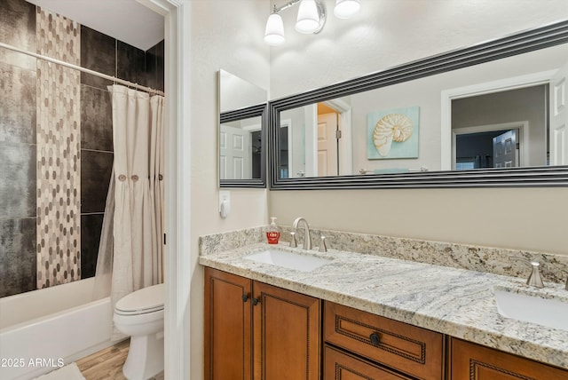 bathroom with double vanity, a sink, toilet, and shower / bathtub combination with curtain