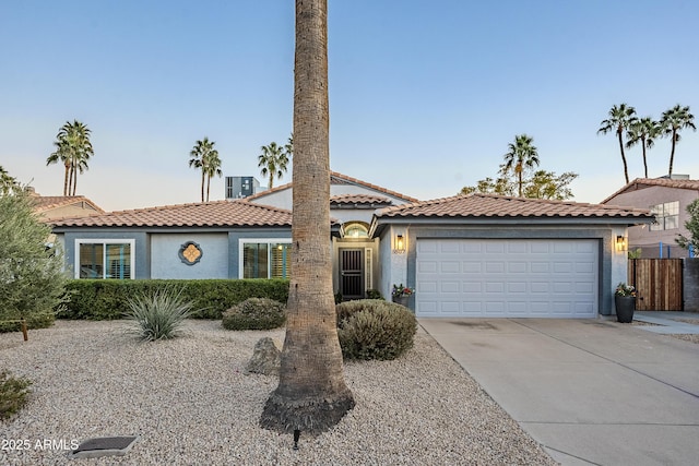 view of front of property with a garage