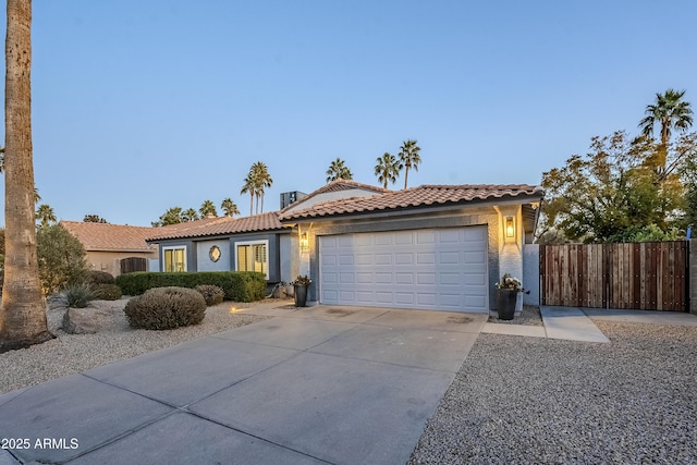 view of front of property with a garage