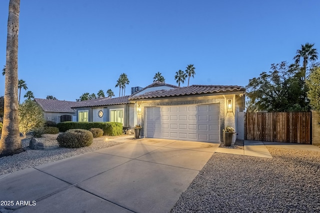 view of front of home with a garage