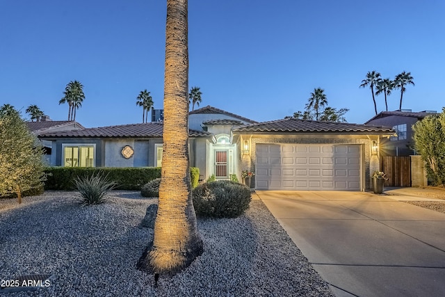 view of front of home with a garage