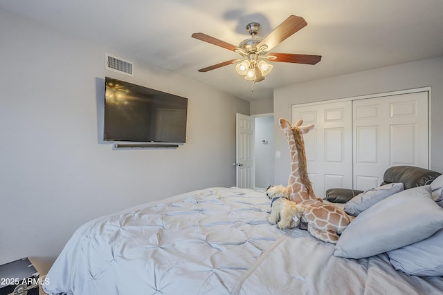 bedroom featuring a closet and ceiling fan