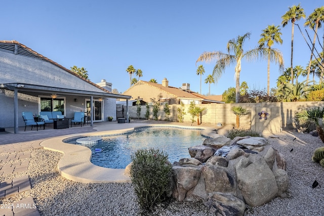 view of swimming pool featuring an outdoor hangout area and a patio