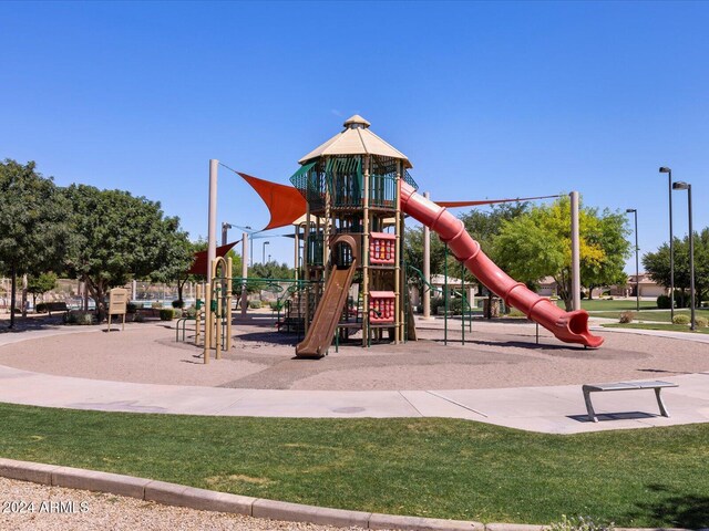 view of jungle gym with a yard