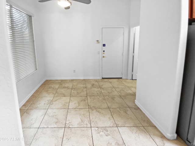 empty room with a ceiling fan