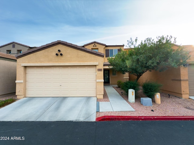 view of front of property featuring a garage