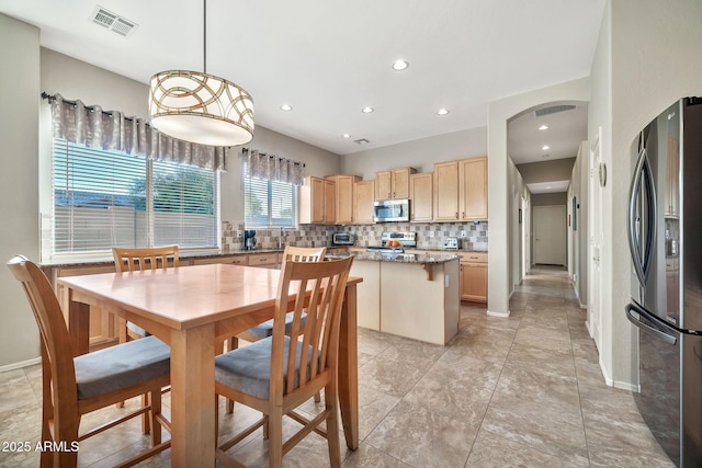 dining space with sink