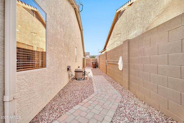 view of property exterior featuring a patio