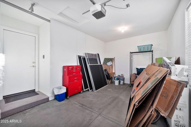 garage featuring a garage door opener