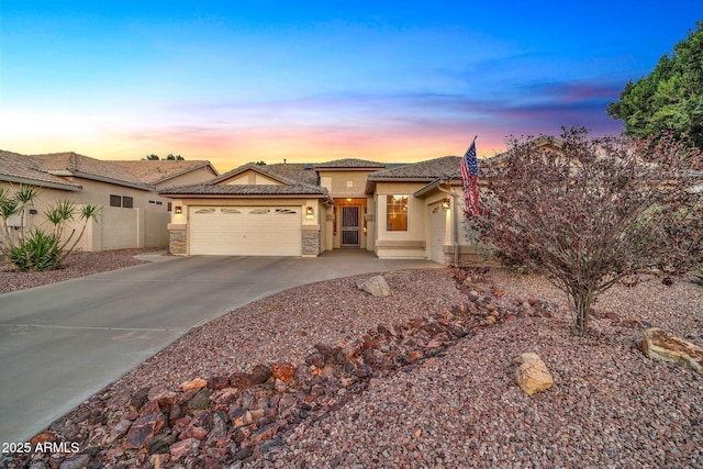 view of front of property featuring a garage