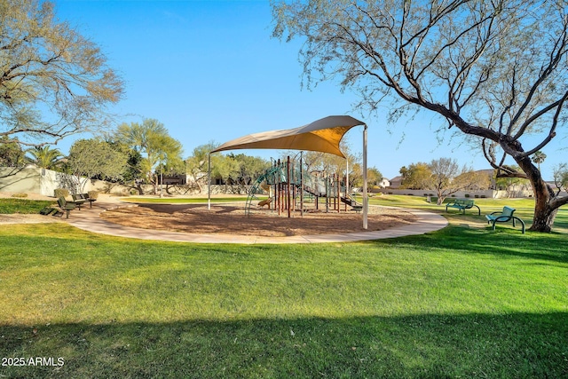 view of jungle gym with a lawn