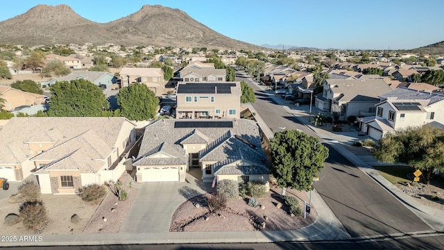 birds eye view of property featuring a mountain view