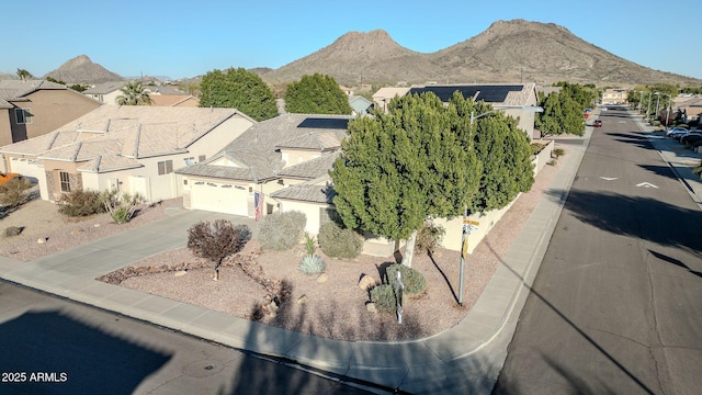 drone / aerial view featuring a mountain view