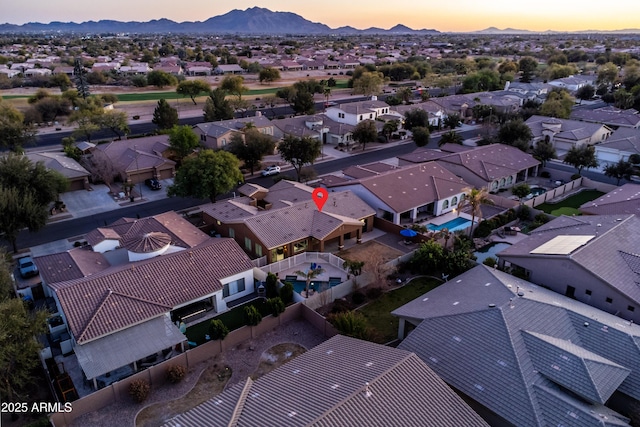 bird's eye view featuring a residential view and a mountain view