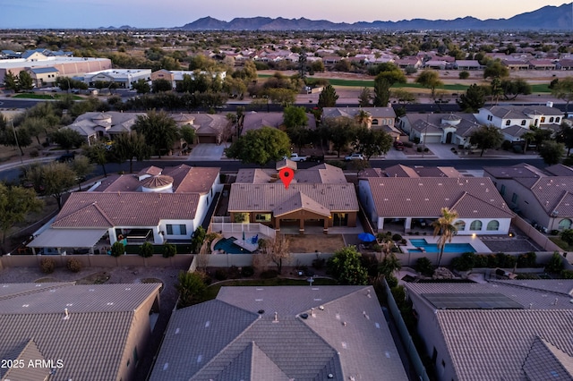 birds eye view of property with a residential view