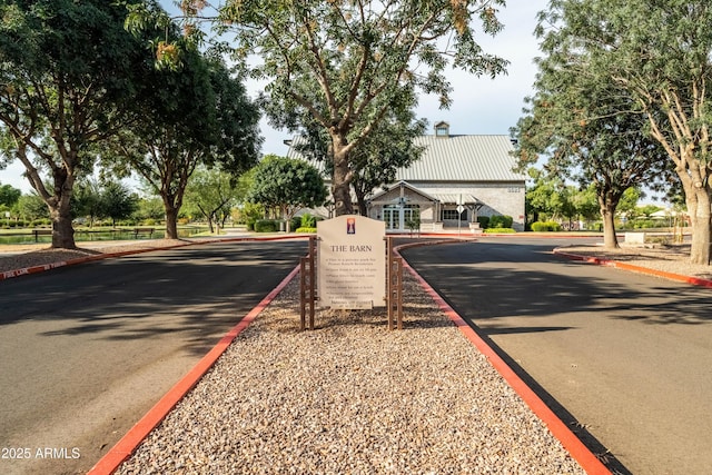 view of road featuring curbs