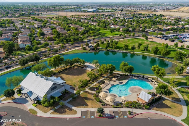 aerial view featuring a residential view and a water view