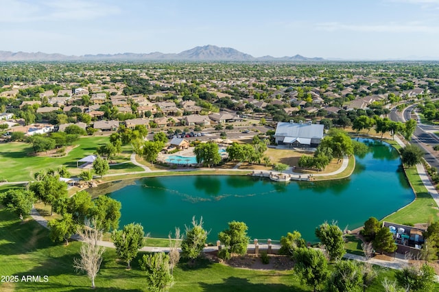 bird's eye view with a residential view and a water and mountain view