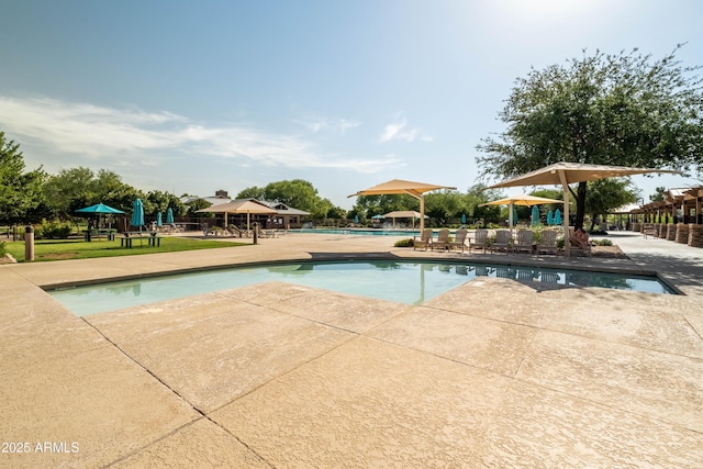 community pool with a patio