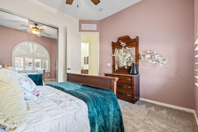 bedroom with a closet, light colored carpet, visible vents, a ceiling fan, and baseboards