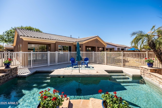 view of pool with a fenced in pool, a patio, and fence