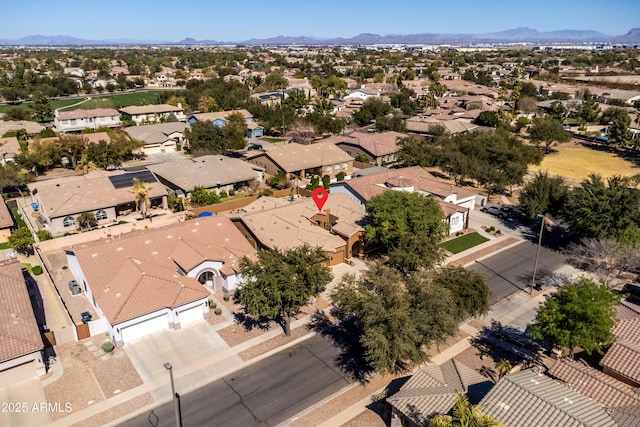 birds eye view of property featuring a residential view and a mountain view