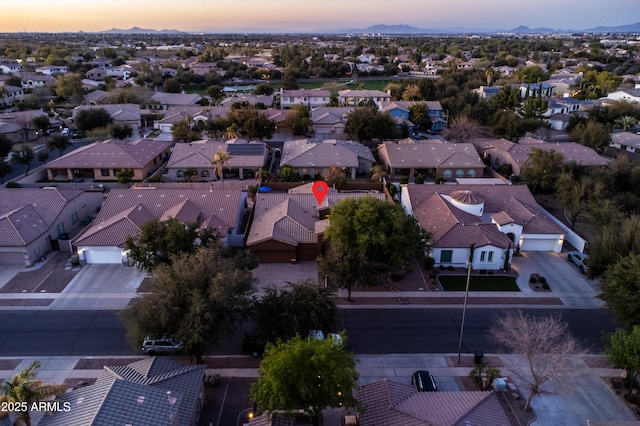 aerial view at dusk with a residential view