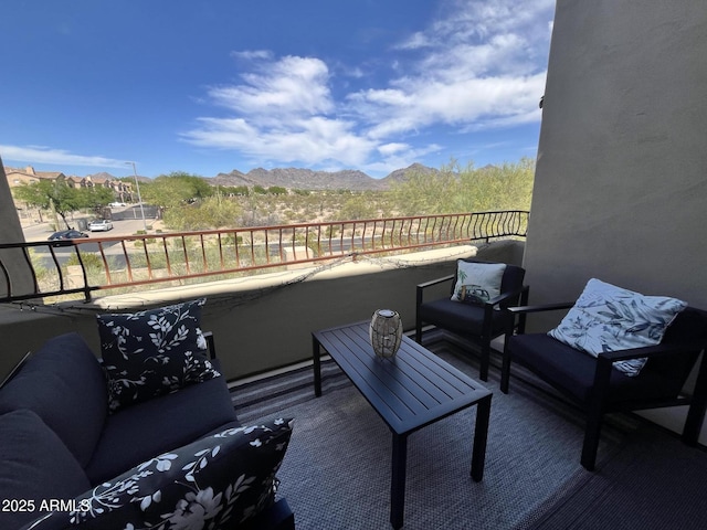balcony featuring a mountain view