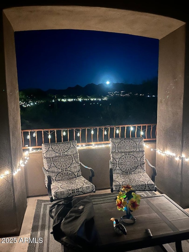 view of patio / terrace with a balcony