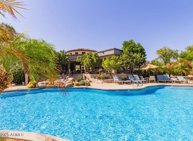 19550 N Grayhawk Dr Unit 2023, Scottsdale, AZ 85255 - community pool with a patio