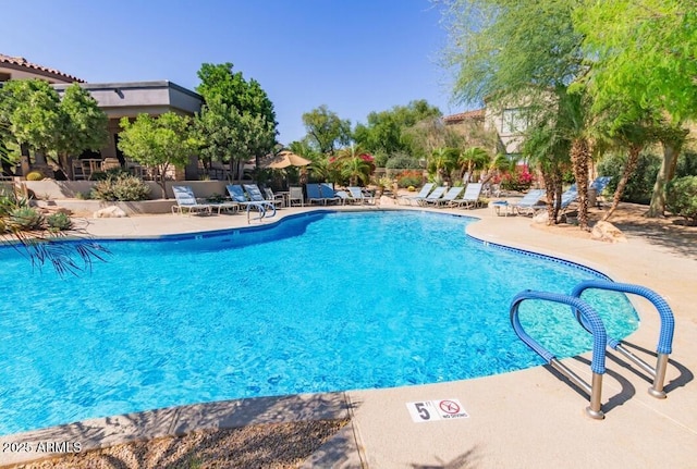19550 N Grayhawk Dr Unit 2023, Scottsdale, AZ 85255 - community pool with a patio