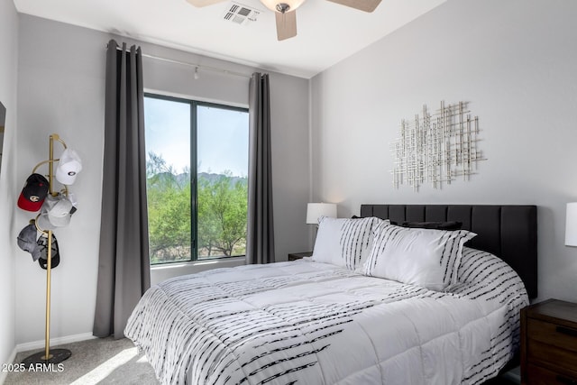 19550 N Grayhawk Dr Unit 2023, Scottsdale, AZ 85255 - bedroom featuring carpet, multiple windows, baseboards, and a ceiling fan