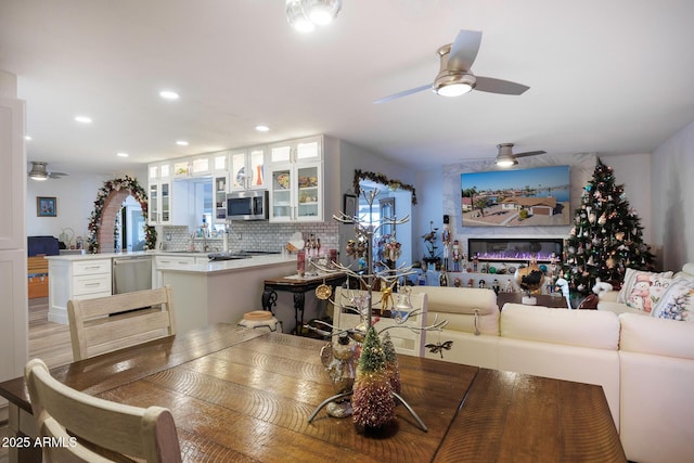 dining room featuring ceiling fan