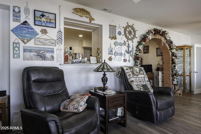 living area featuring dark hardwood / wood-style flooring