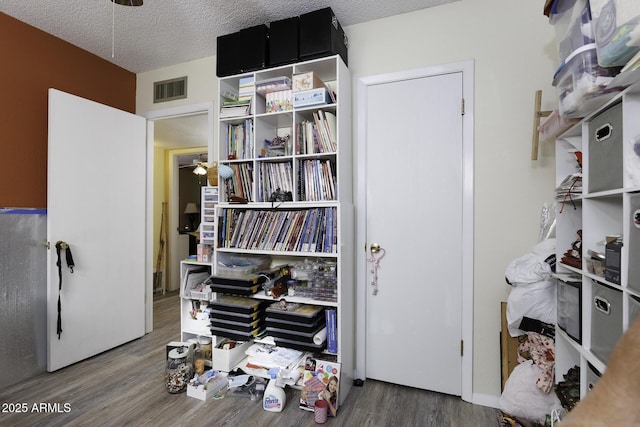 office with a textured ceiling and hardwood / wood-style flooring