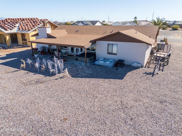 rear view of house with a patio area