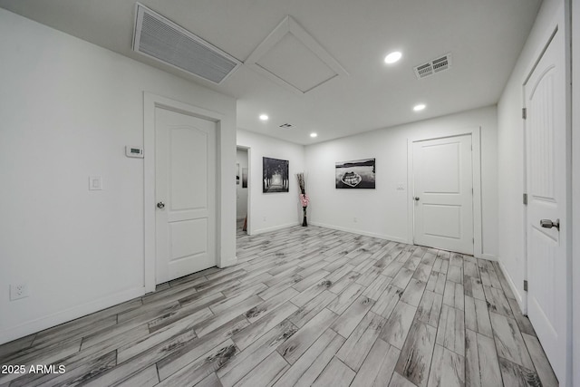 unfurnished room featuring light wood-type flooring