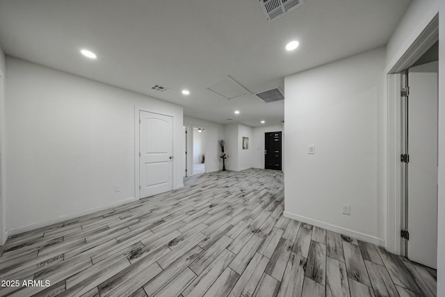 unfurnished room with light hardwood / wood-style floors