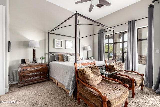 bedroom featuring visible vents, ceiling fan, and carpet floors