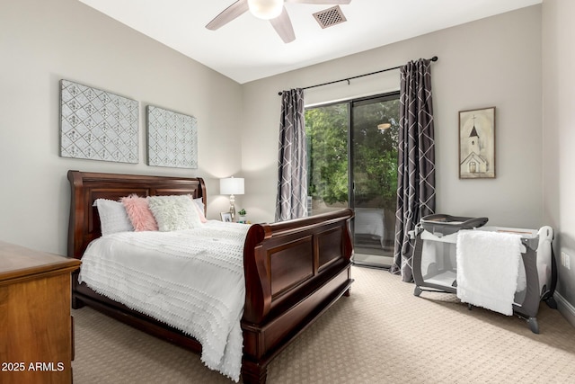 carpeted bedroom featuring visible vents, a ceiling fan, and access to outside