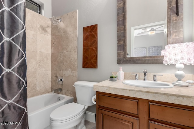 full bath featuring a ceiling fan, shower / tub combo, toilet, and vanity