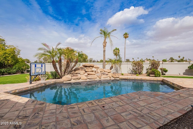 view of pool with a fenced in pool, a patio, and a fenced backyard