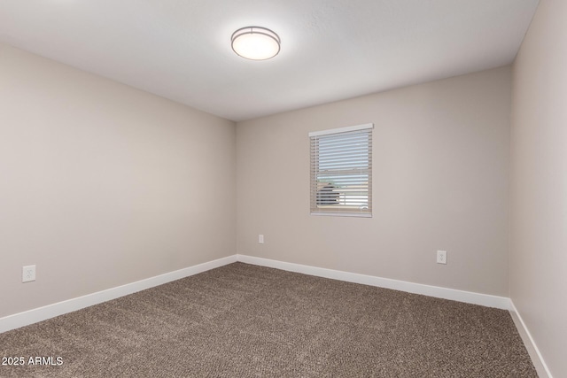 unfurnished room featuring carpet flooring