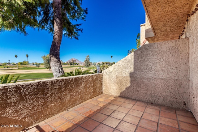 view of patio / terrace featuring a mountain view