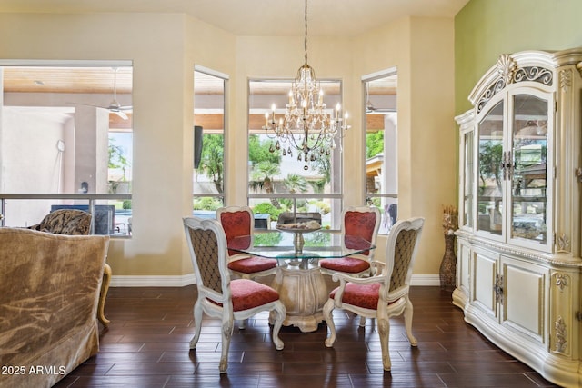 6428 W Eugie Ave, Glendale, AZ 85304 - dining area featuring baseboards, a chandelier, and wood tiled floors